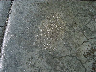 This sealer was over applied. It should have been applied 1 to 2 mils thick, but was likely 20 to 30 mils thick.