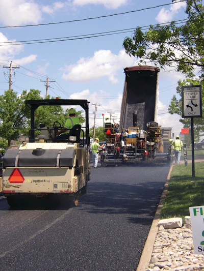 The key to compaction success after the mix has been placed is to roll the mat while it is still hot, so it's important the roller follow close behind the paver.
