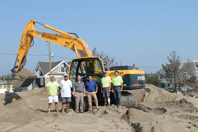 From Left to Right: Scott Hulse, Town of Mantoloking; Larry Gilman, Town of Mantoloking; Kevin Murphy, Northeast District Manager, Hyundai Construction Equipment; Victor Riga, Vice President of Sales, Harter Equipment; Bill Heckman, Town of Mantoloking; Bill Lackey, Town of Mantoloking.