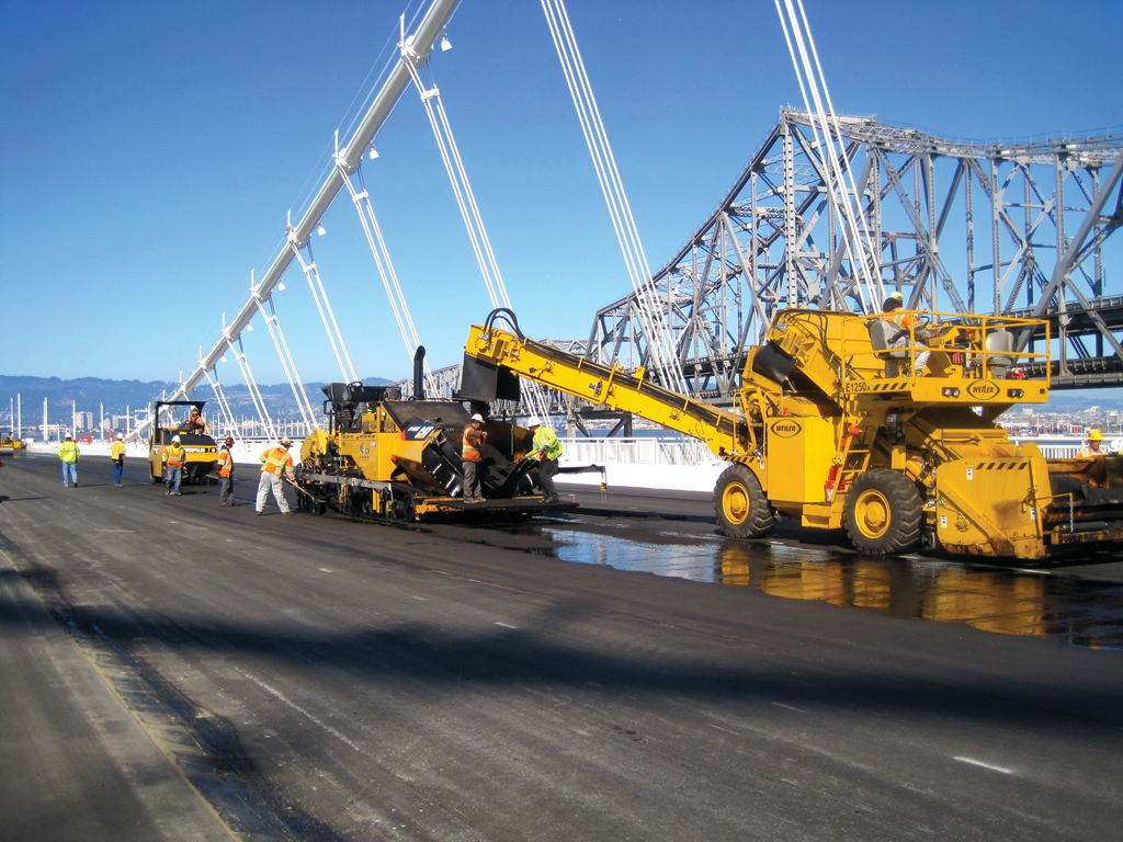 The Weiler E1250A RTV helped the paving train move continuously and consistently.