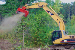 Bob Ray Company used a Caterpillar 336 excavator with a Fecon BH80 mulcher head to remove underbrush and volunteer trees up to 12 to 14 in. in diameter along the Watterson Expressway.
