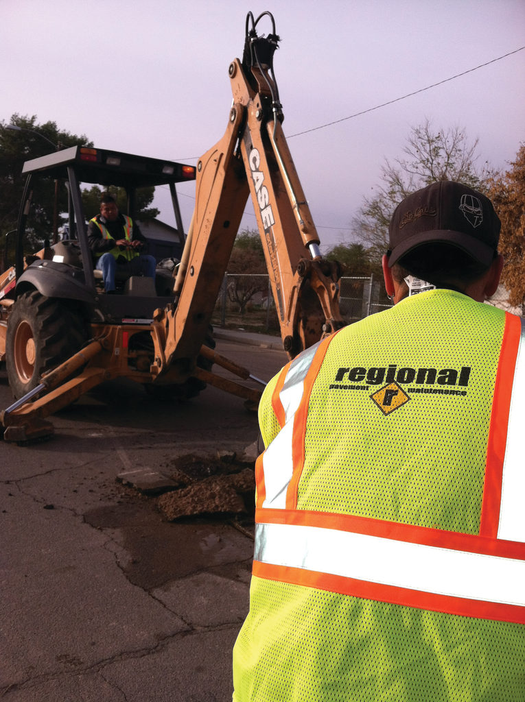 Regional Pavement Maintenance emphasizes safety with every worker on every job. They give each employee a safety vest with the RPM logo