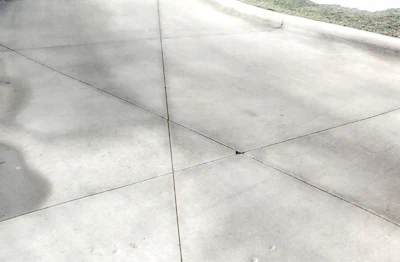 This is an example of poorly laid out joints for a parking lot. The contractor was lucky to not have cracks crossing the many acute angles.