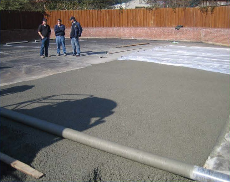 Finishing the pervious concrete was done with roller-screed strike-off, covered with plastic and rolled, and then received a plastic cover cure.