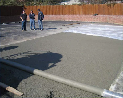 Finishing the pervious concrete was done with roller-screed strike-off, covered with plastic and rolled, and then received a plastic cover cure.