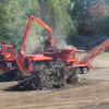The integrated loader on this Morbark 1300G tub grinder provides a good view down to the mill.