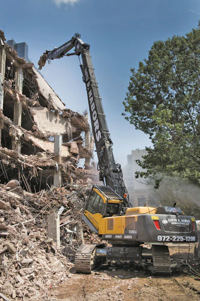 During the later stages of the project, crews worked up to 10 hours a day seven days a week, with the high reach doing 99 percent of the tear down work and a Volvo EC380D and EC360C with grapples partnering to separate and scoop debris into hauler trucks.