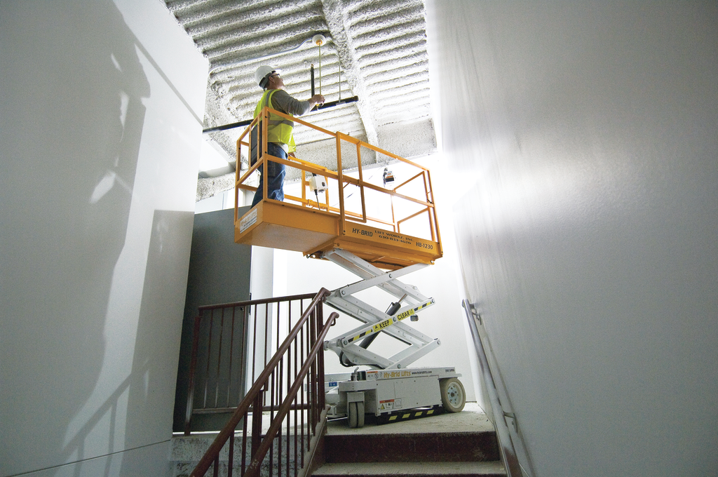 Operators can maneuver low-level-access scissor lifts into spaces that might be too hazardous for ladders or scaffolding.