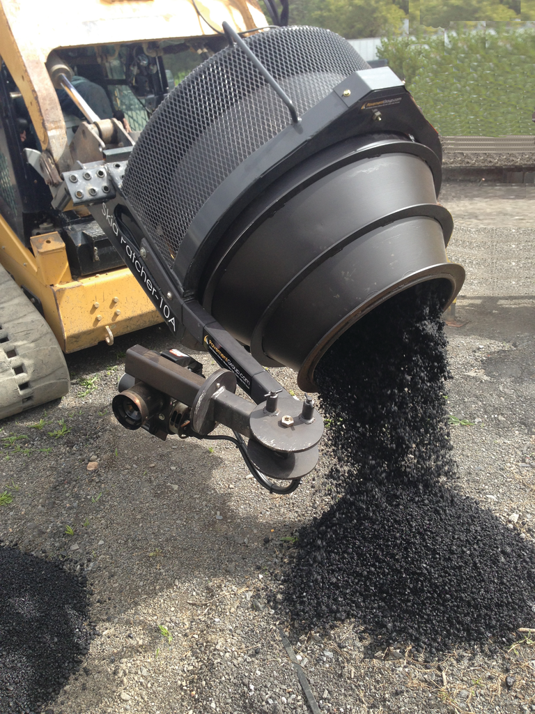 The SkidPatcher10A recycles old asphalt millings into a 300 degree F hot mix that is ready for laydown in just 10 minutes.