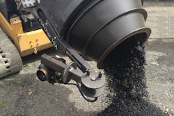 The SkidPatcher10A recycles old asphalt millings into a 300 degree F hot mix that is ready for laydown in just 10 minutes.