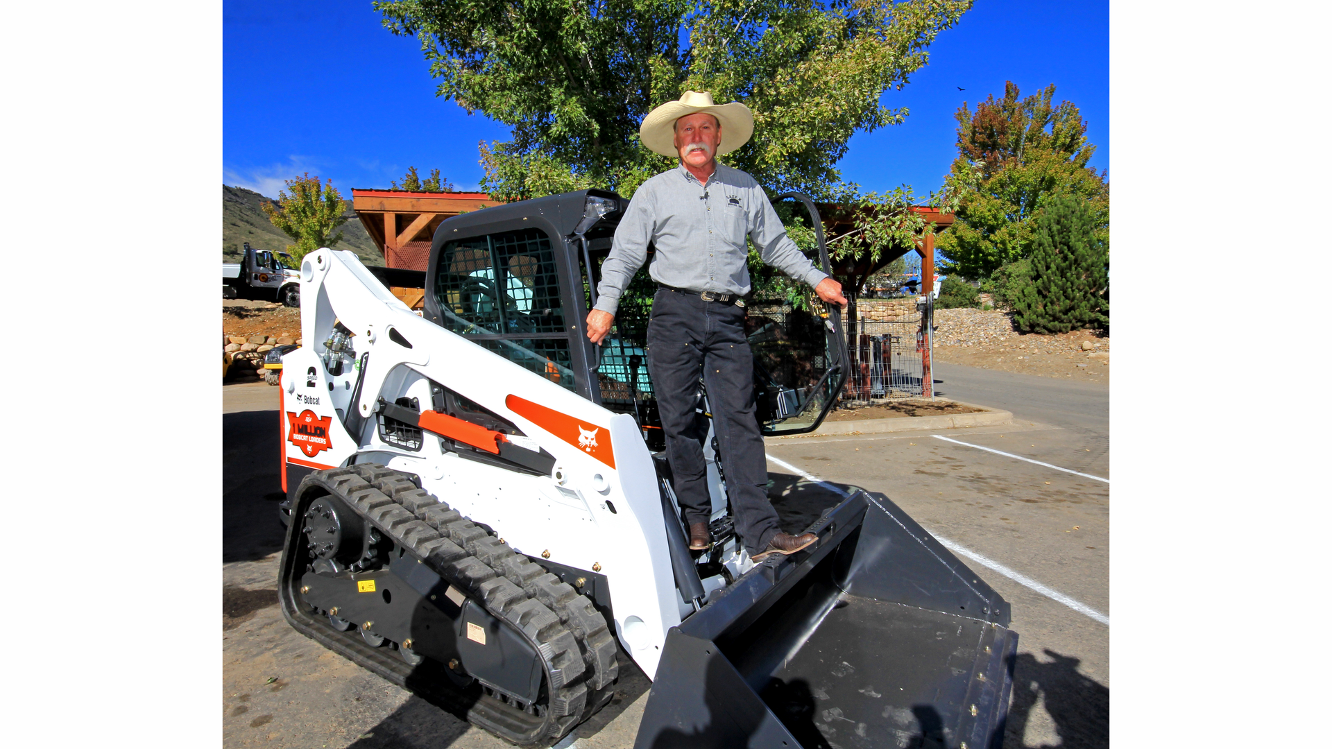 Bobcat's One-Millionth Loader contest winner Steve Klumker with his new Special Edition One-Millionth Bobcat T650 compact track loader.