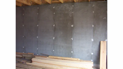 The modeled look of a new concrete basement is evidence of the moisture that is still present at the surface and within the structure of the wall.