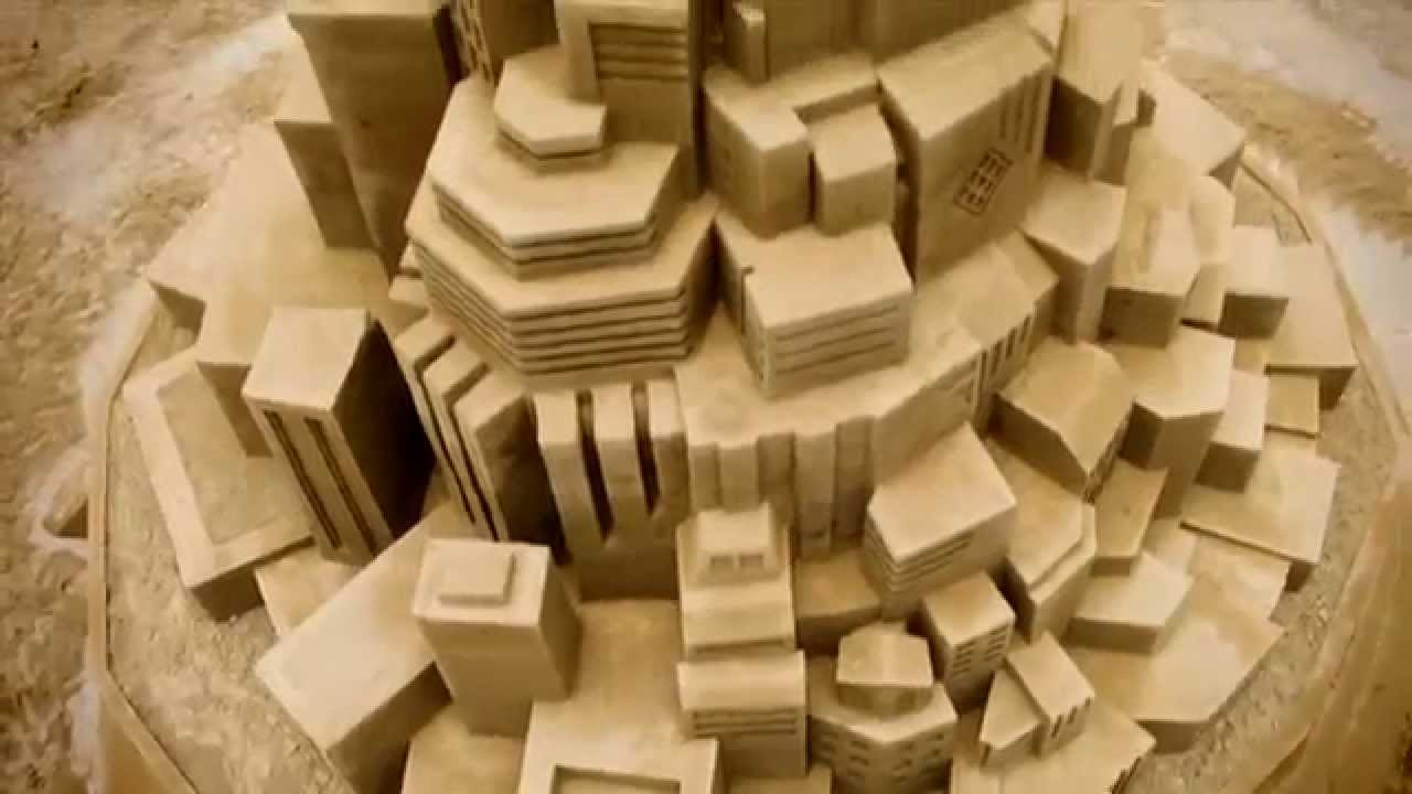 VIDEO: How Caterpillar Built the World's Tallest Sandcastle