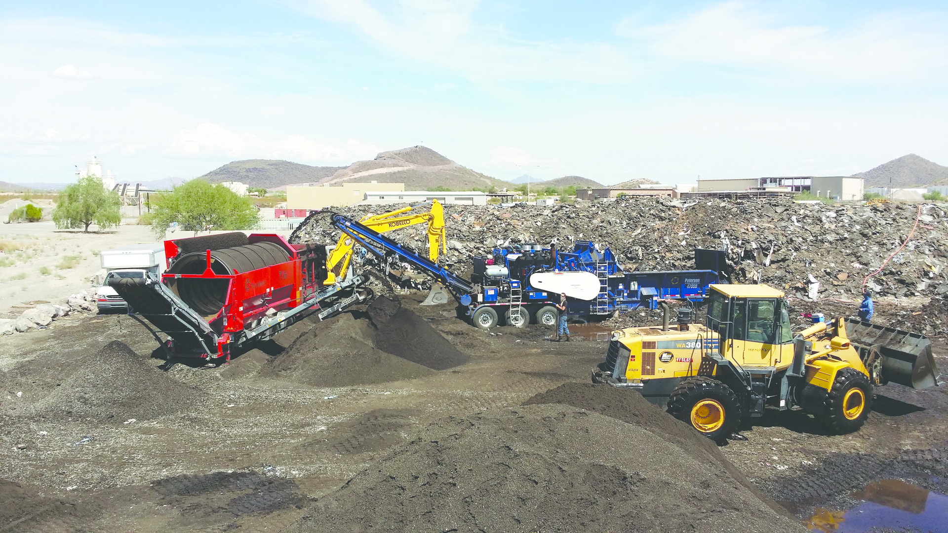 JML Energy Resources LLC in Brentwood, TN, uses the Peterson 4700B Horizontal Grinder for daily production of recycled asphalt shingles (RAS).