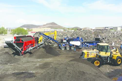 JML Energy Resources LLC in Brentwood, TN, uses the Peterson 4700B Horizontal Grinder for daily production of recycled asphalt shingles (RAS).