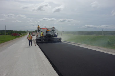 Norris Asphalt Paving had an 11-person crew on the six-week Iowa Highway 92 project, which began at the end of May 2014. The company was responsible for the paving portion of the highway rehab.