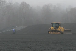 The 24-in. layer of leachate collection stone was the last layer, which was placed on top of 60-mm-thick High Density Polyethylene (HDPE) sheet.