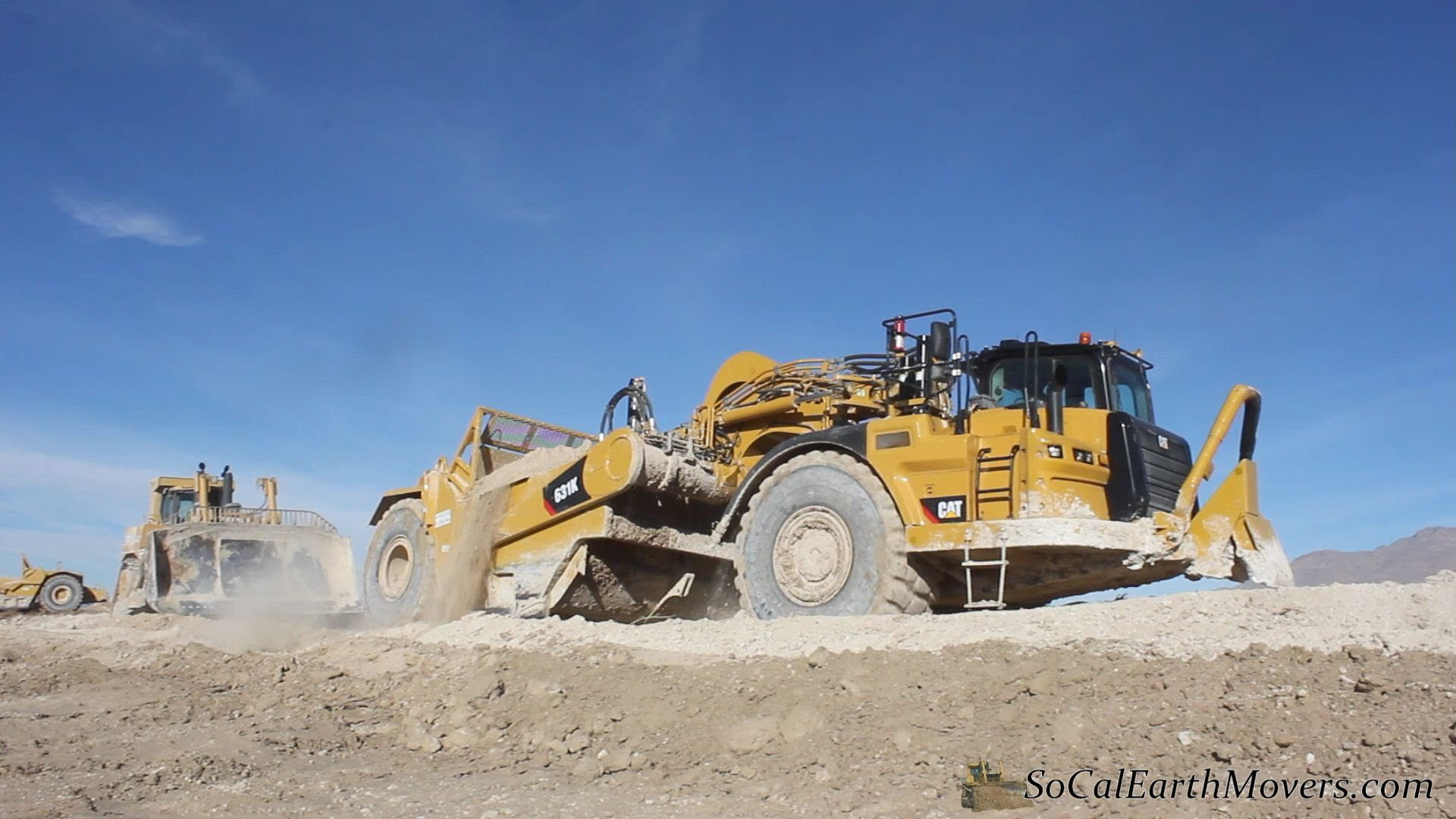 Video: Brand New Cat 631K Scraper Working Hard in Southern California