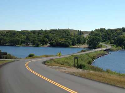 Knife River Materials, Bemidji, MN, for work on Barnes County Highway 21, just north of Valley City, ND. The roughly 11.5-mile full-depth mill-and-overlay project used more than 20,000 tons of asphalt. The scope of the project included about 30 asphalt patches, .75-inch milling, and then two inches of reclaimed asphalt pavement surface on top.