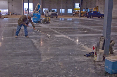Joints are normally cut shortly after the last finishing process is complete using early entry saws. They are spaced two to two-and-a-half times the thickness of the slab. High dosage synthetic or steel fiber concrete slabs are cut along column lines or greater.