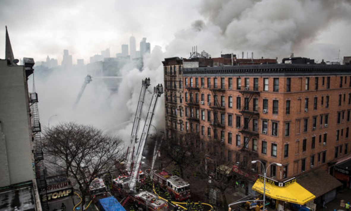 This photo from 4 NBC New York shows smoke after construction workers allegedly hit a gas line causing a massive fire and explosion which resulted in the collapse of three buildings and at least 25 injuries.