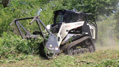 Surgical Land Clearing uses a 111-hp Terex PT-110 Forestry compact track loader with a Loftness brush cutter attachment to cut through undergrowth and trees up to 8 in. in diameter.