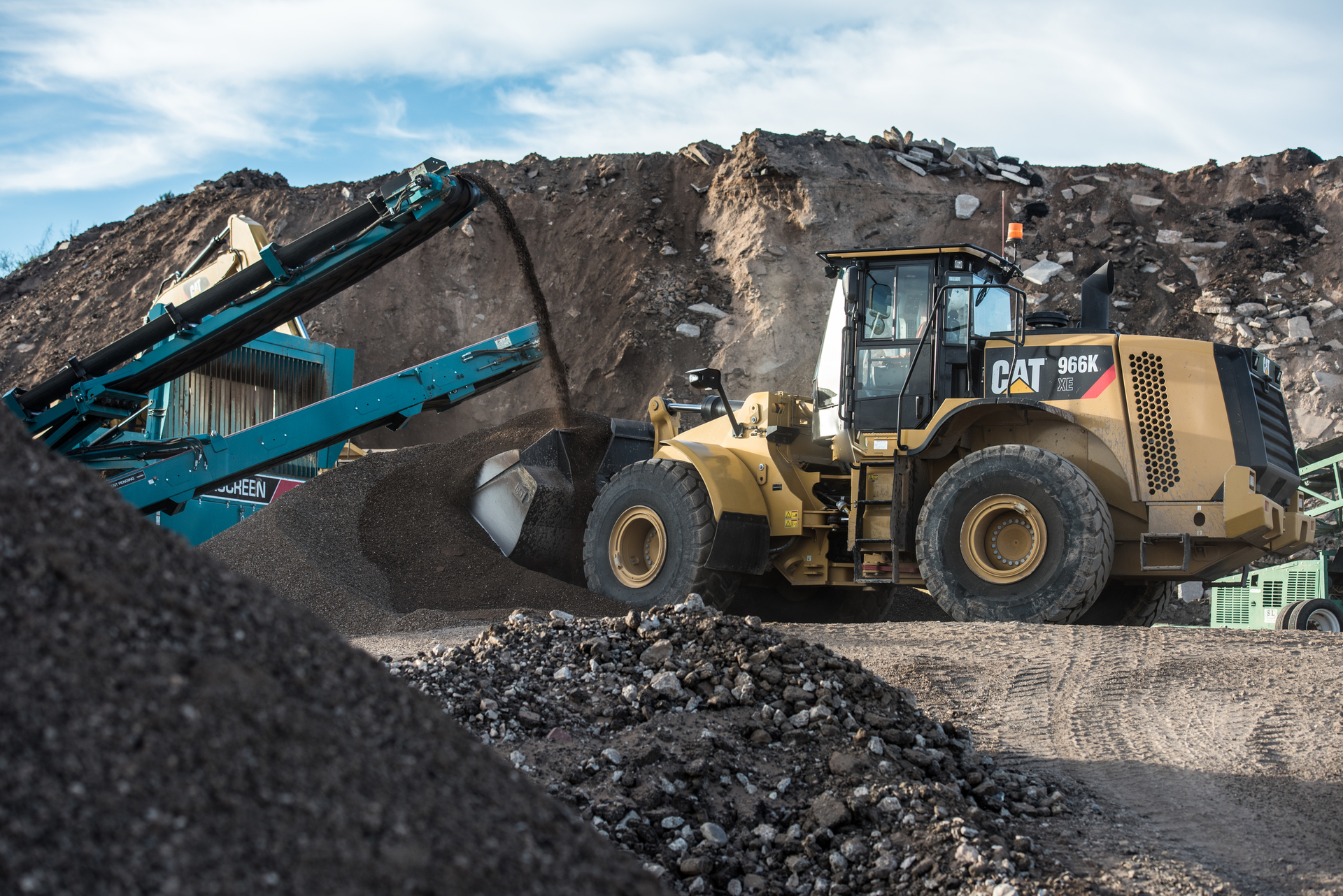 In the year since Sierra Mining traded a couple of loaders for the new 966K XE, the recycling yard’s loader has recorded consistent 1.5- to 1.75-gallon-per-hour fuel economy advantage over its 966H models.