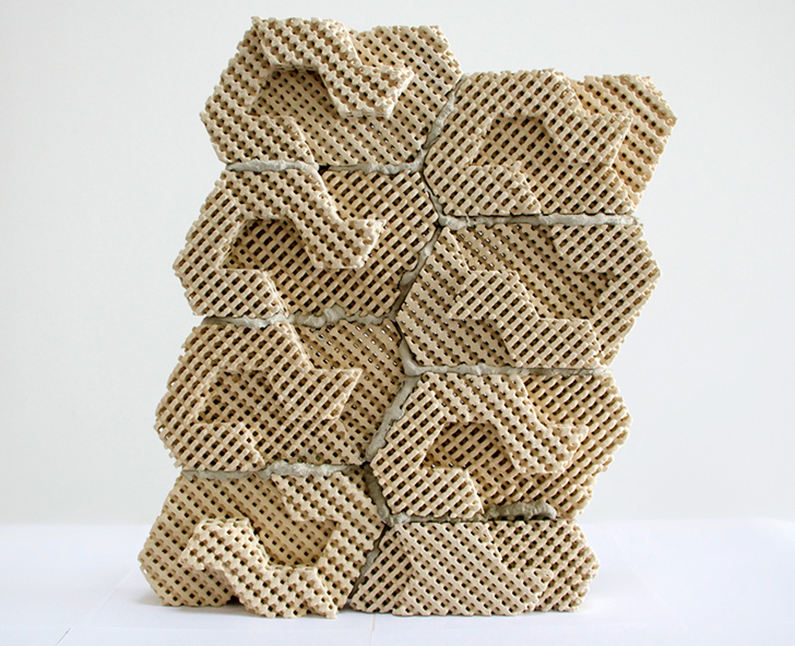 These 3D-printed ceramic bricks are held together with mortar and provide a cool, protective layer against a wall, which helps keep it insulated from heat.
