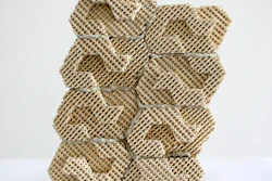 These 3D-printed ceramic bricks are held together with mortar and provide a cool, protective layer against a wall, which helps keep it insulated from heat.