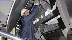 Mixing tip wear needs to be evaluated periodically or when blending quality of the HMA appears inadequate. These mixing tips are reversible to allow increased service life. Drum buildup removal should be performed in conjunction with rotating mixing tips (paddles).
