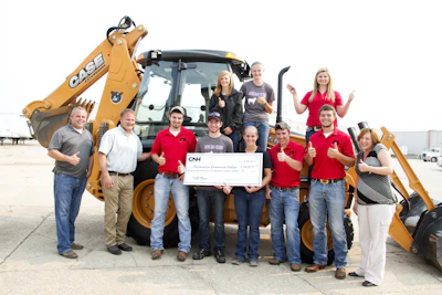 Students and staff of Southeastern Community College with the newly donated Case 580N backhoe.