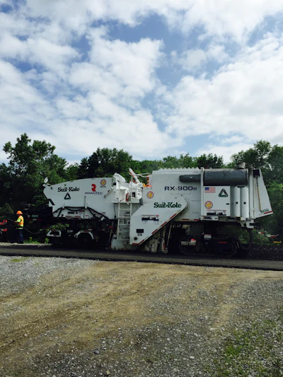 The modified cold planer used on Highway 243 had a 1.5-foot wider frame and no conveyors.