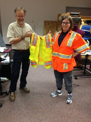 Dr. Tom Martin and Ph.D. student Kristen Hines with the newest prototype of the InZoneAlert construction vest.