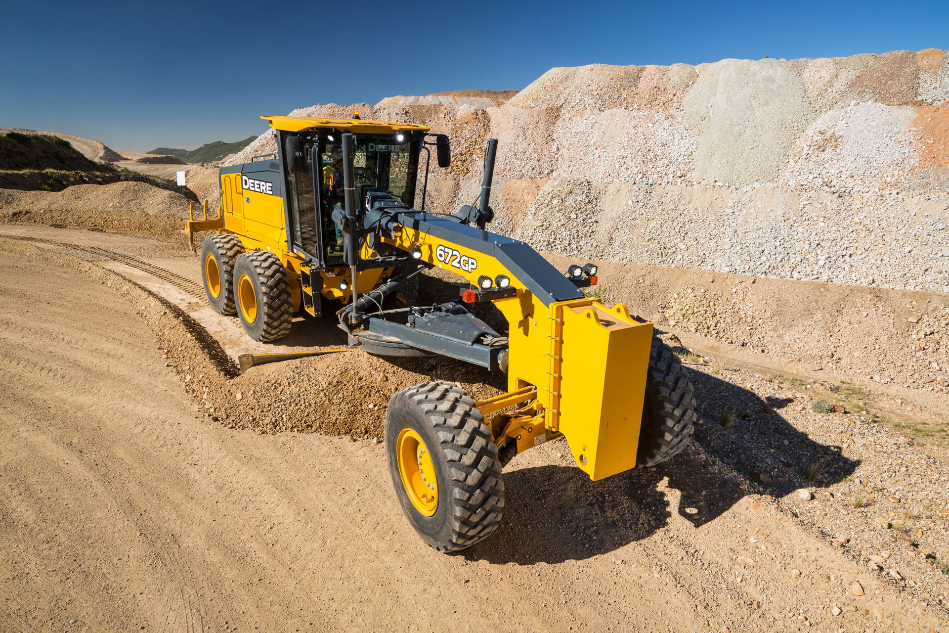 Cross slope and an open architecture approach to grade control systems are two useful tools that John Deere offers as standard equipment on its Grade Pro models.