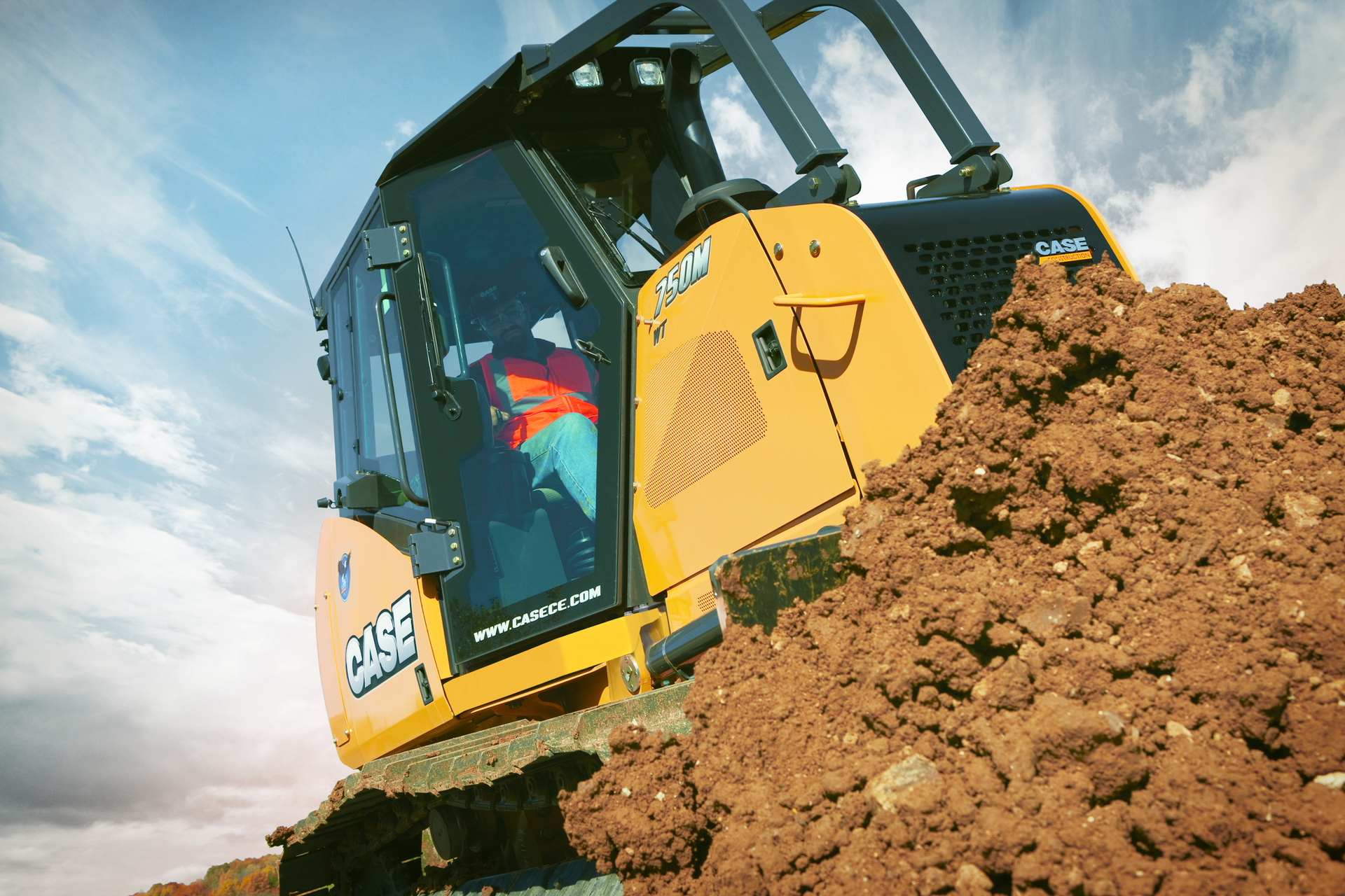 A Case 750M dozer was the first model to roll off the new production line at CNH Industrials' Burlington, IA facility.