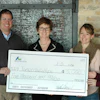 From left to right: Carl Wistreich, President and CEO of AC Business Media; Barb Endl, Executive Director, Tomorrow's Hope; Kayla Brown and April Van Etten, representing the AC Business Media employees