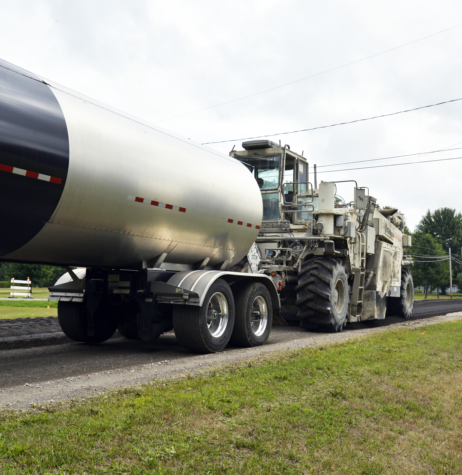 In Monroe County, MI, full depth reclamation, engineered asphalt emulsion is injected into reclaimed materials as they are mixed.