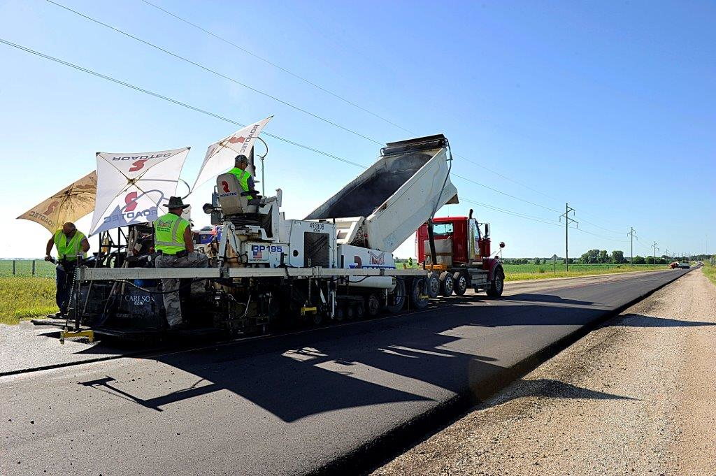 The pilot project involved an 8-mile resurfacing job on Highway 69 in Central Iowa. The first phase of the pilot was completed without telematics. The second phase used Earthwave Fleetwatcher to monitor HMA delivery trucks and two pavers used on the job.