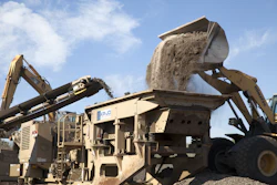 Any overs from the crushing process are fed from the middle-deck screen back to the impactor, where it is crushed again to make a finished product. This product is then conveyed and stockpiled to be added to the asphalt plant.