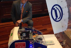 CEO Robert Flitsch with Ice Resurfacing Addibot 56fd5a26b0146