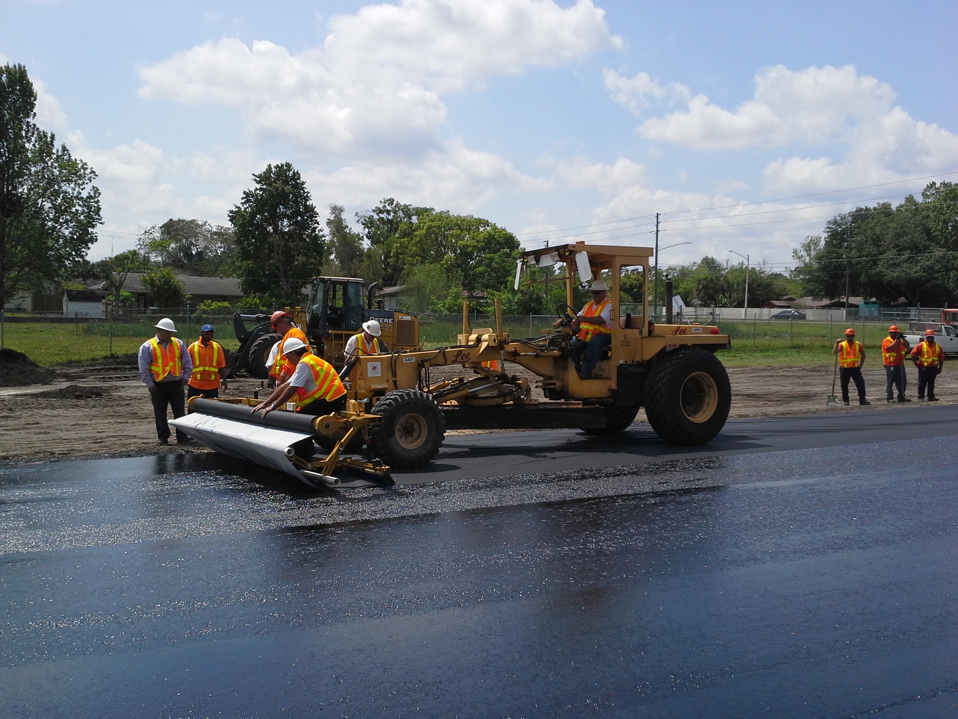 Orange County Public Works relied on Geotextile Apparatus Co.’s Grizzly Cub fabric/grid installation machine, attached to a motor grader, to properly place the geogrid on its projects.
