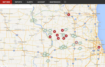 This EAMS overview screen shows individual Helm Group machines on location as red dots. Arrows in the dots show direction of travel, and a square in the dot shows the machine is stopped. Circles with numbers inside represent clusters of assets, with the number representing how many units are on site. As you zoom in the cluster spreads apart to reveal the individual assets.