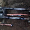 The Same Path slitting head has been retrieved all the way back to the extraction cage, never having left the path of the in situ pipe.