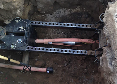 The Same Path slitting head has been retrieved all the way back to the extraction cage, never having left the path of the in situ pipe.