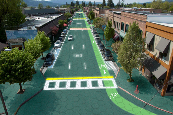 Artist's rendition of downtown Sandpoint, Idaho, with a road designed by Solar Roadway. The company is working with the Missouri Department of Transportation to test a solar road in Conway, Mo.