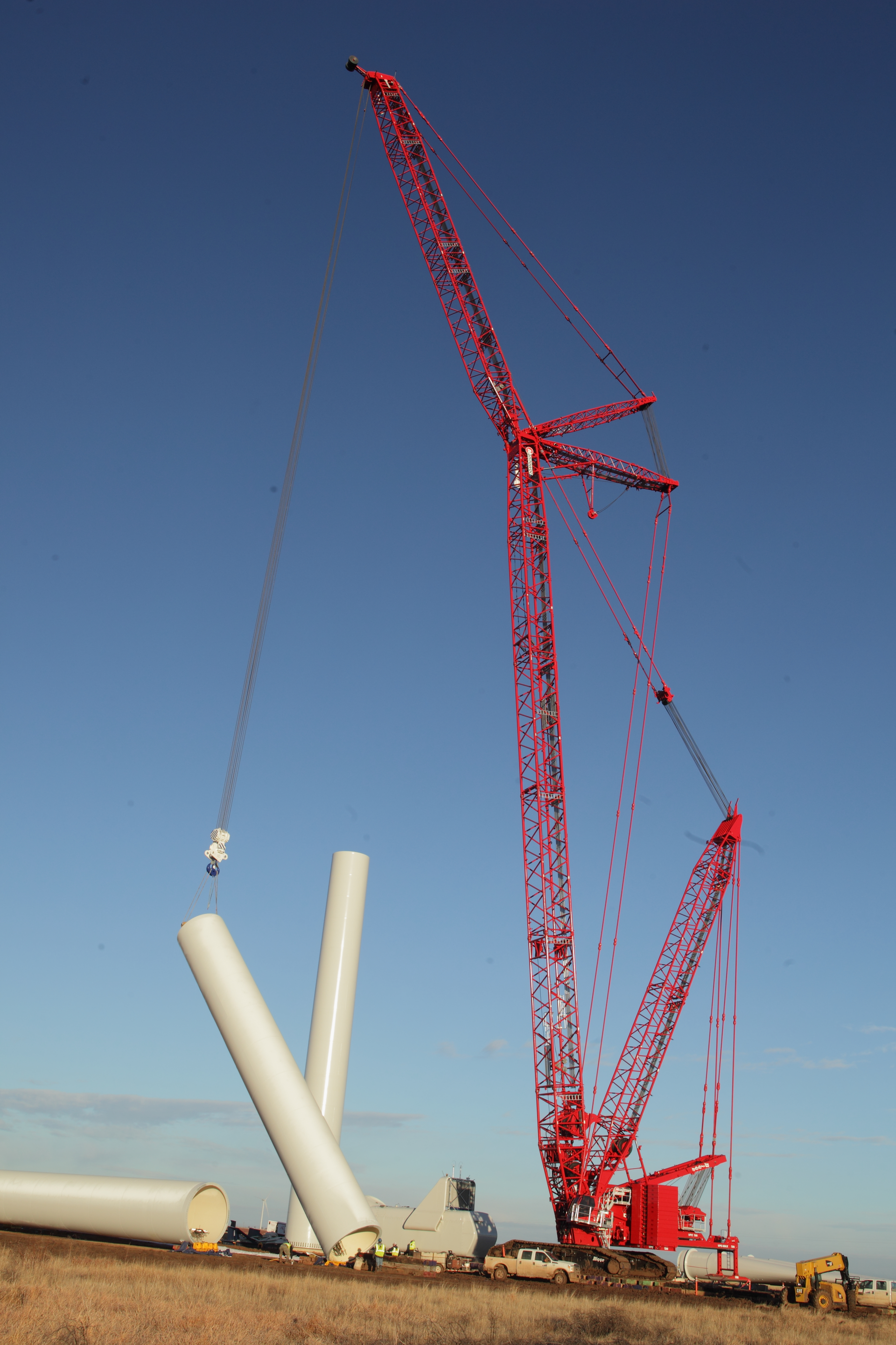 On this project, Mortenson is using a new wind turbine construction method that would not have been possible with previous generations of crawler cranes: It’s building the 194-ton wind turbine assemblies on the ground first, and then lifting the entire unit 300 ft. into the air before attaching it to the top of the tower. This allows assembly of the unit much faster than in the air, reducing the number of picks and the impact of wind on the project.