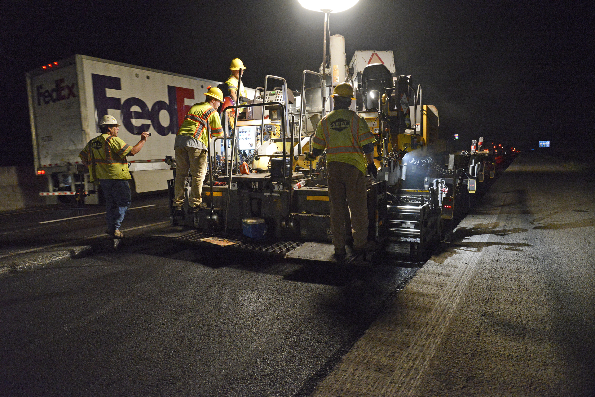 Warm mix modifier enables swift placement of deep lifts, allowing urgent traffic to return to I-85 in time for morning rush hour.