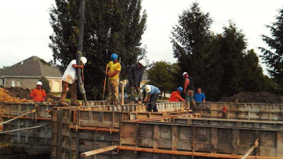 Figure 2: “Wall walker certified in a residential foundation contractor fall protection plan to work along a “controlled access zone.”