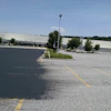 The first step was cleaning the pavement using walk-behind blowers, brooms and sweeping equipment. That was followed by cracksealing and the first coat of sealer.