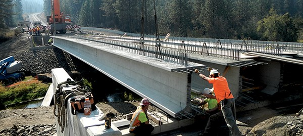 136.8-ft.-long prestressed concrete super girders for the new Miles Creston Bridge in Lincoln County, Wash., are 58 in. tall with 49-in.-wide top flanges to maximize span length, minimize the number of girders and allow clearance above the river for a 100-year flood.